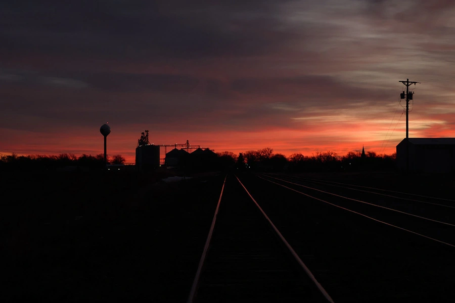 Photo taken by Colette Rathke showcasing a road leading to a sunset